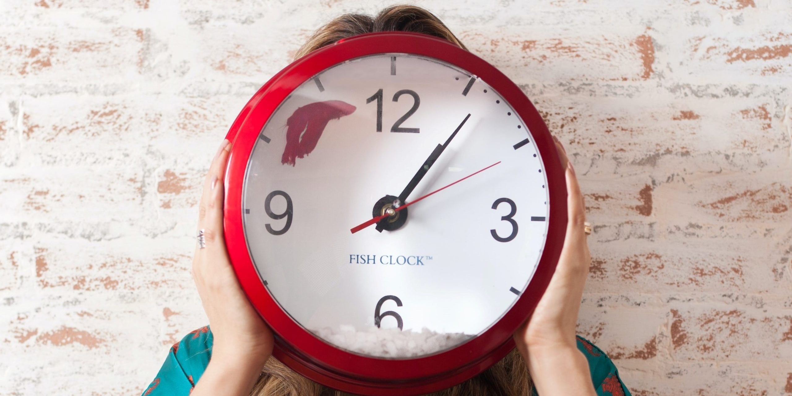 me time represented by a young woman holding a clock above her head
